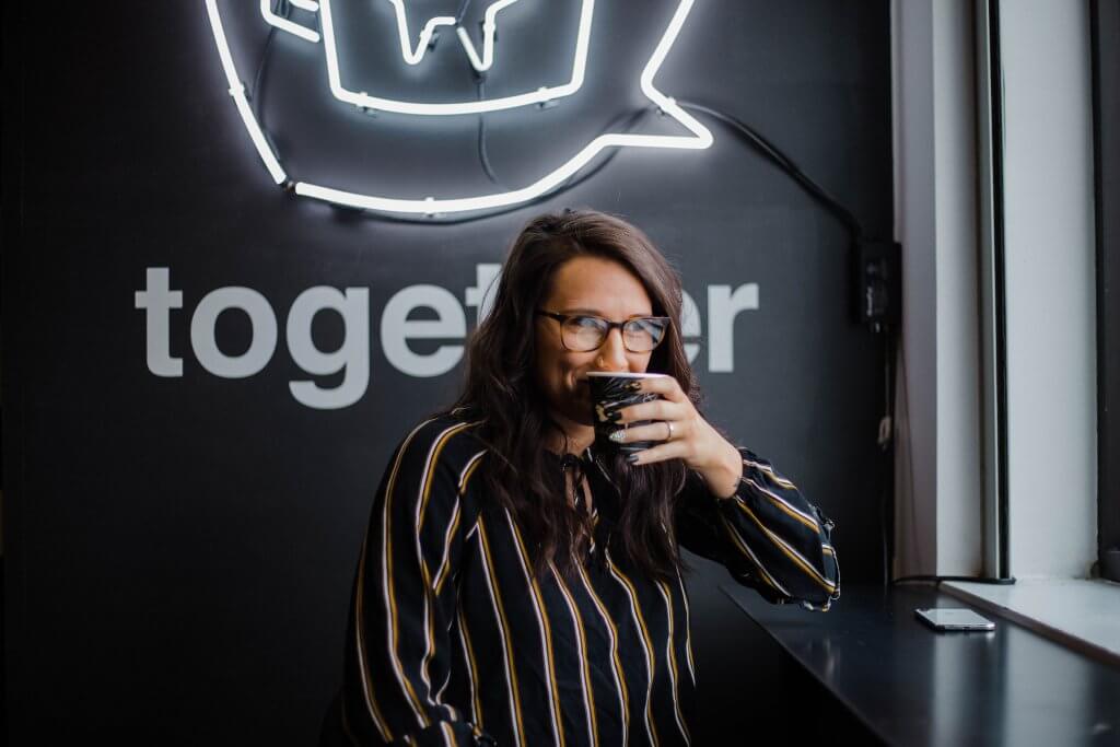 How to Vet Employee Referrals 8 woman drinking coffee