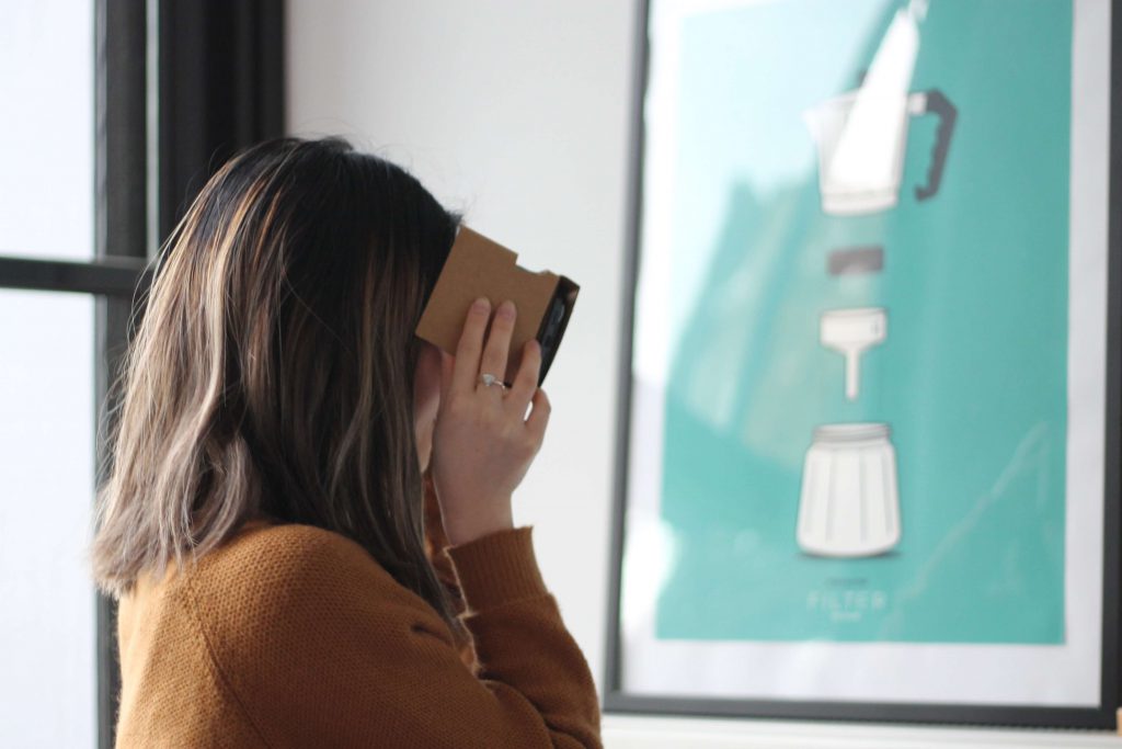 4 Big Impacts of Virtual Reality in Recruitment 2 Woman with a virtual reality tool