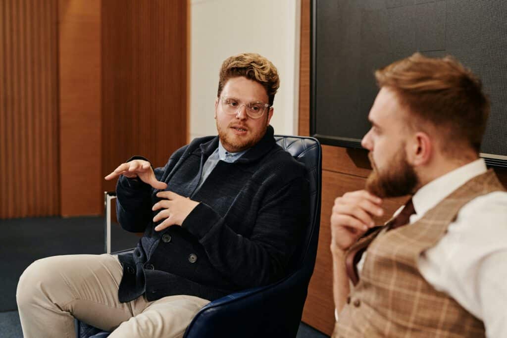 A Complete Guide to Situational Interview Questions for Finding Ideal Candidates 10 A candidate explaining in an interview