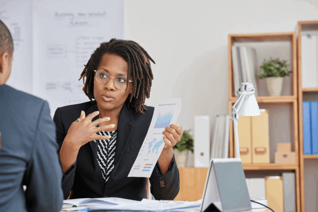 How to Recruit Financial Advisors: Essential Financial Advisor Skills & Strategies 1 Businesswoman presenting statistical information