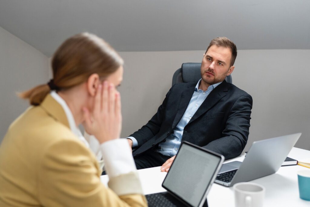 AI Bias in Hiring: How Smart TA Leaders Can Fix It 1 Colleagues looking upset