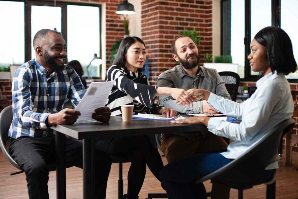 AI Bias in Hiring: How Smart TA Leaders Can Fix It 3 Recruiters greet candidate